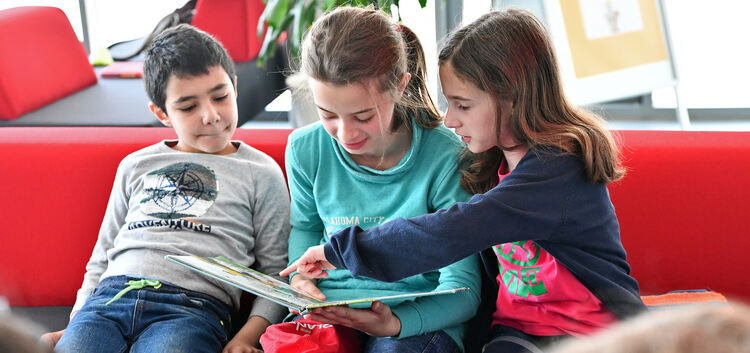 Lesen verbindet - das erleben Kinder der Konrad-Widerholt-Förderschule und der Freihof-Realschule bei ihren Treffen.  Foto: Mark